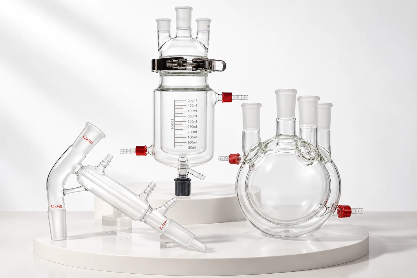Studio composition of a jacketed reactor, four-neck jacketed flask and short-path condenser